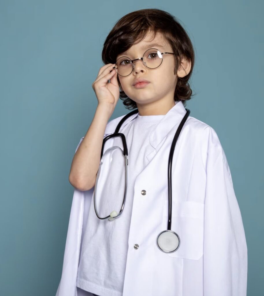 young kid in doctors uniform